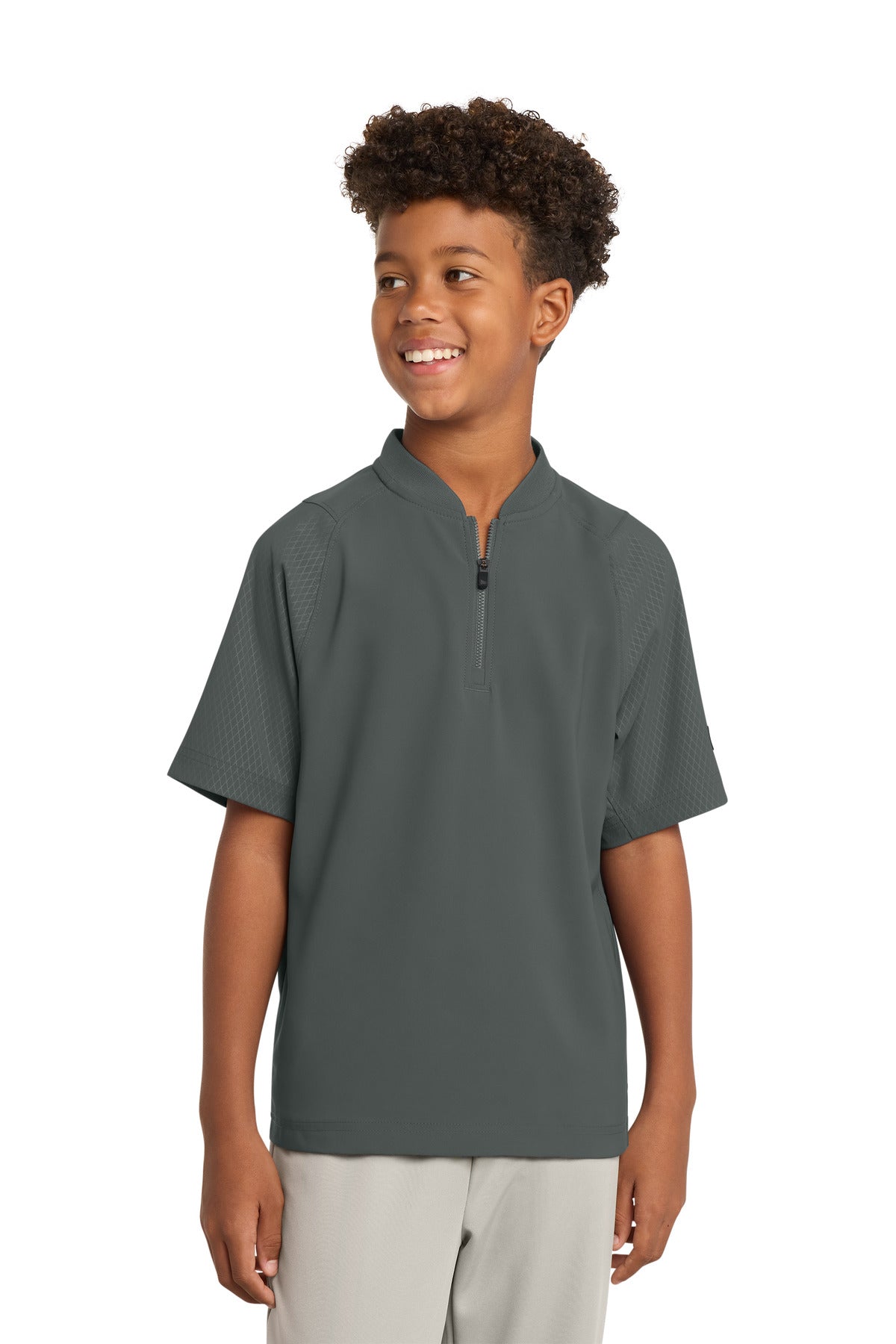 New Era  Youth Cage Short Sleeve 1/4-Zip Jacket. YNEA600